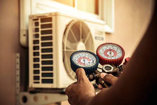 Professional Hvac technician working in Amery, WI